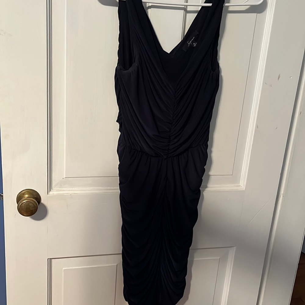 Navy blue ruched mini dress.  Great for a Junior size.